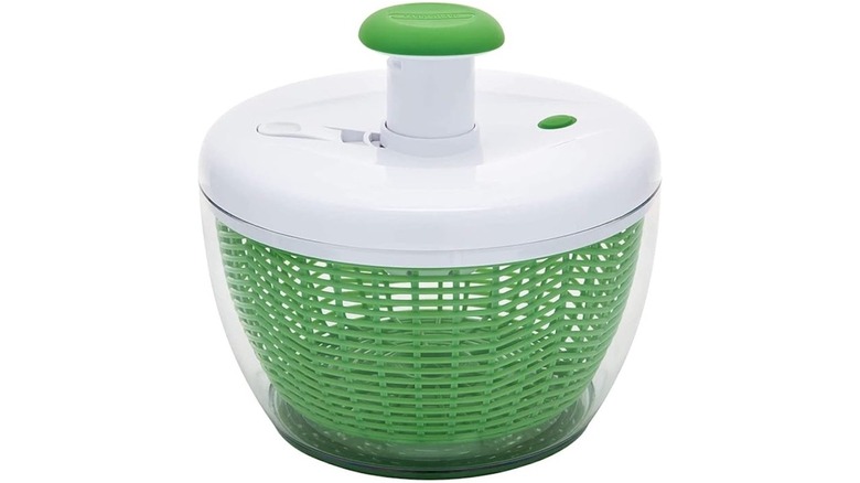 Green Farberware pump-activated salad spinner