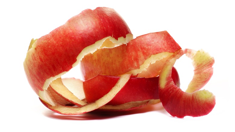 Coiled red apple peels