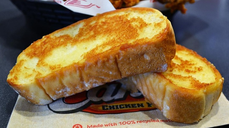 Two slices of texas toast from Raising Cane's.