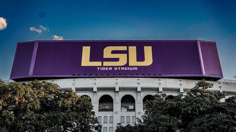 LSU Tiger Stadium with purple sign.