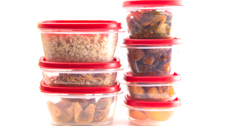 plastic containers with leftover food