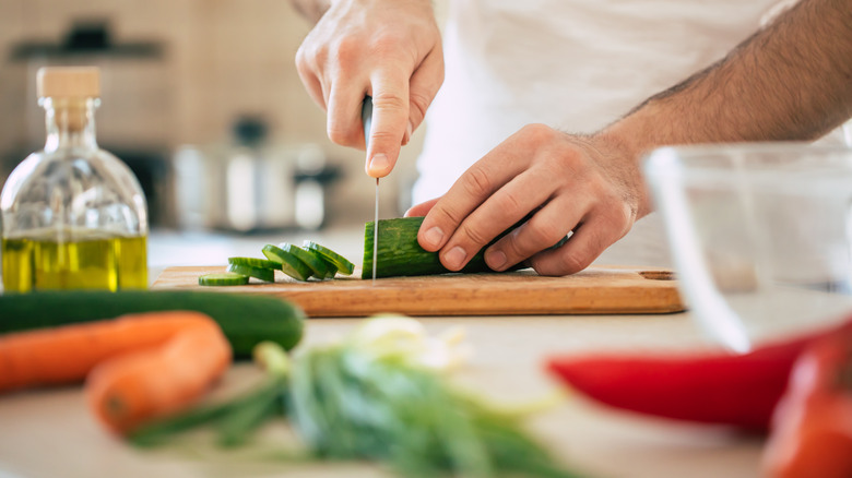 Chef's knife cutting vegetables