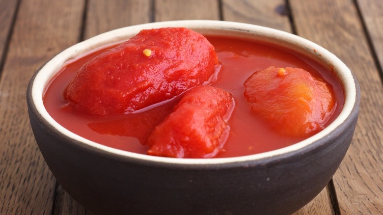 A bowl of whole-canned tomatoes