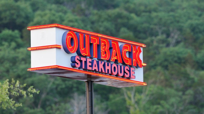 An outdoor Outback Steakhouse sign