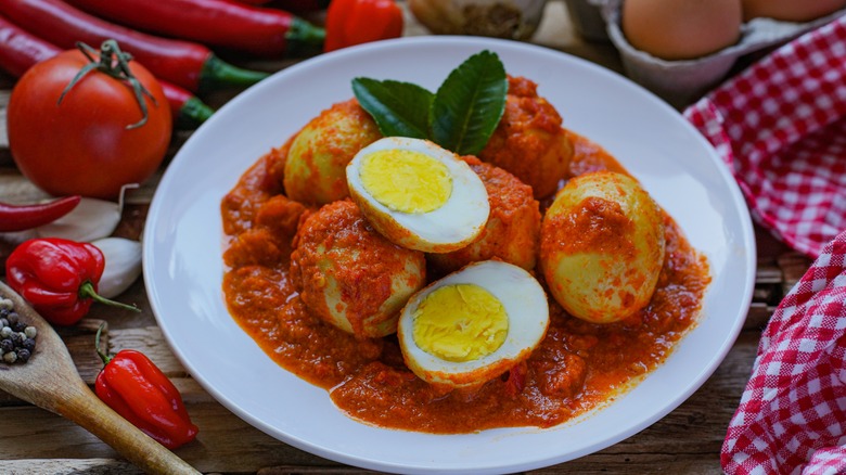 fried boiled eggs in chili sauce