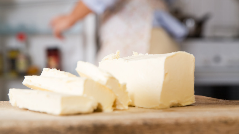 sliced butter block on countertop