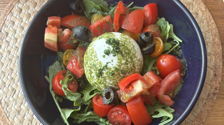 plated pesto and burrata salad