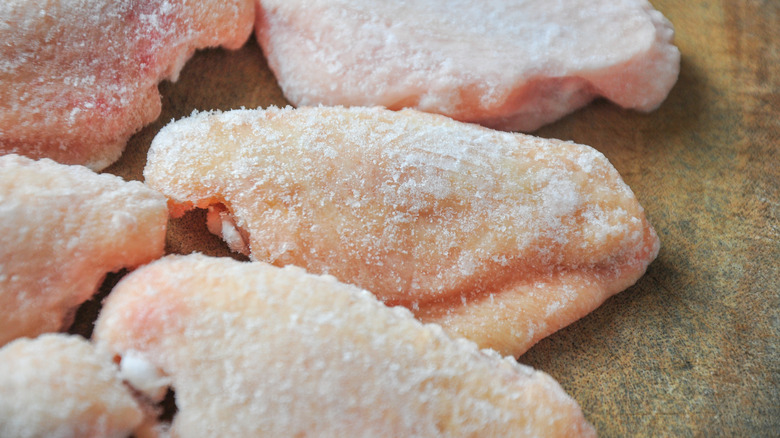 ice on frozen chicken wings