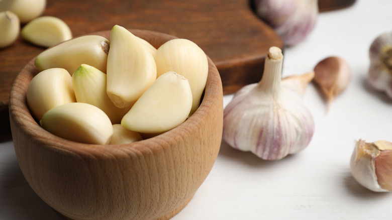 You Can Stop Peeling Your Garlic Before Pressing It. Here's Why