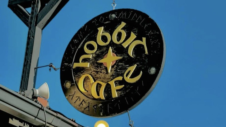 The Hobbit Café sign board