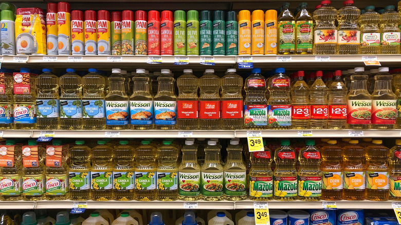 Different oils and sprays on grocery store shelves