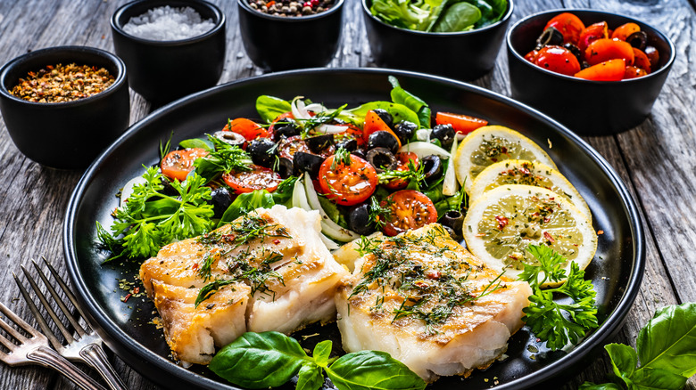 Black cod fillets with salad