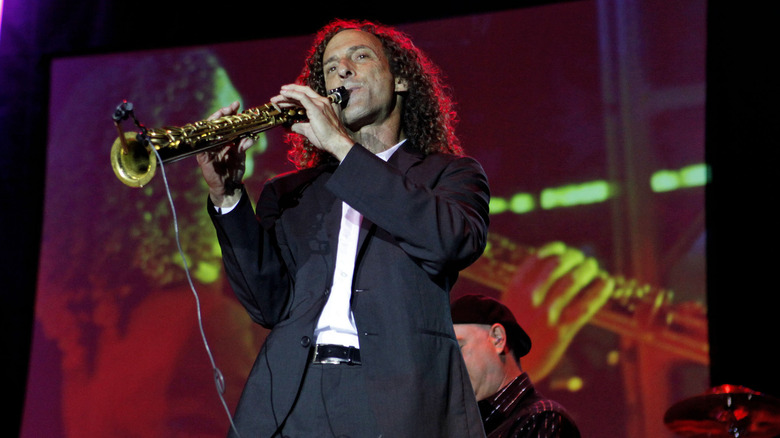 Kenny G. performs with saxophone
