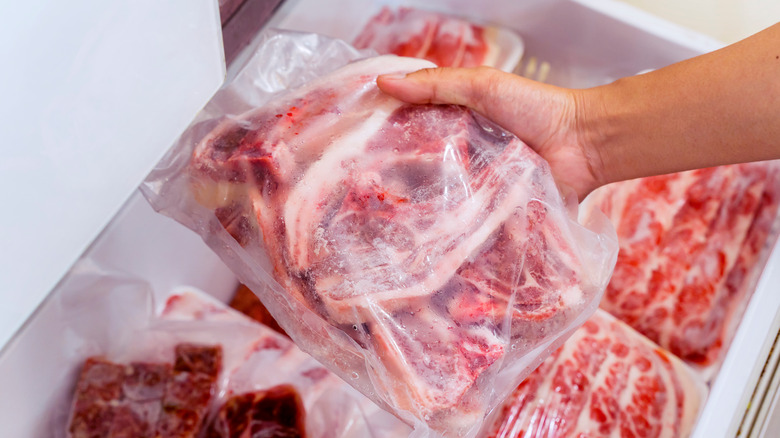 putting packaged meat in refrigerator