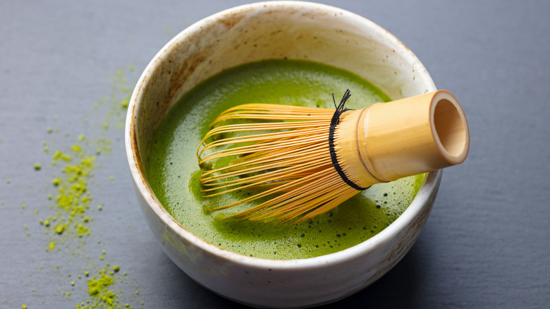 bowl of matcha with whisk