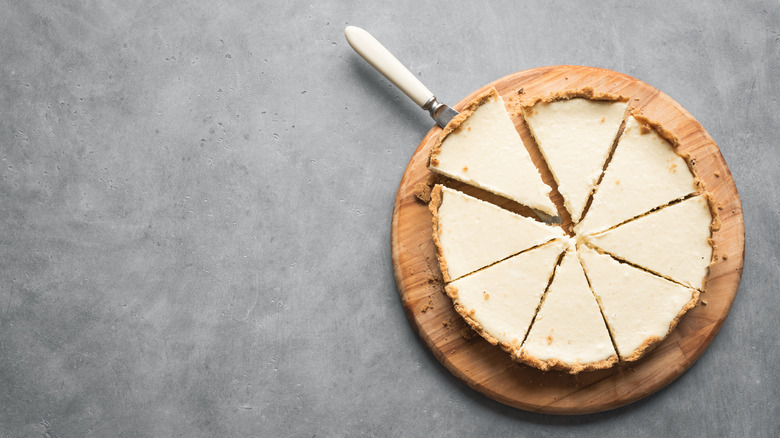 cheesecake sliced into seven pieces