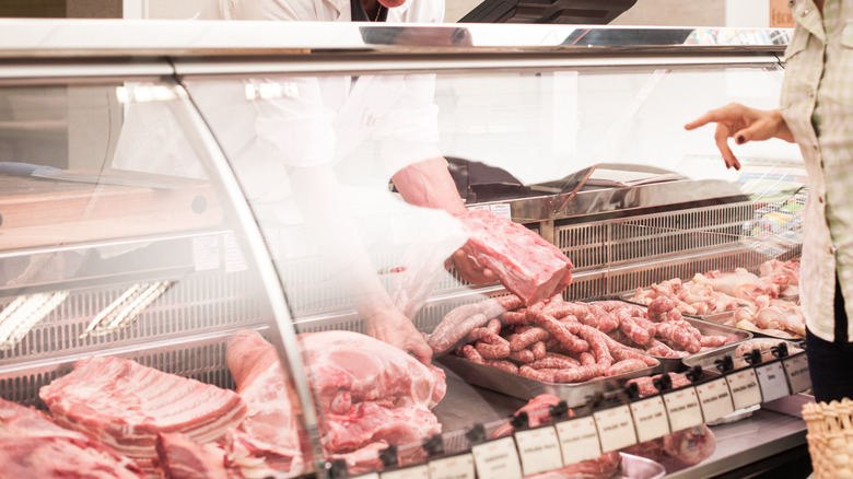 buying meat at butcher shop