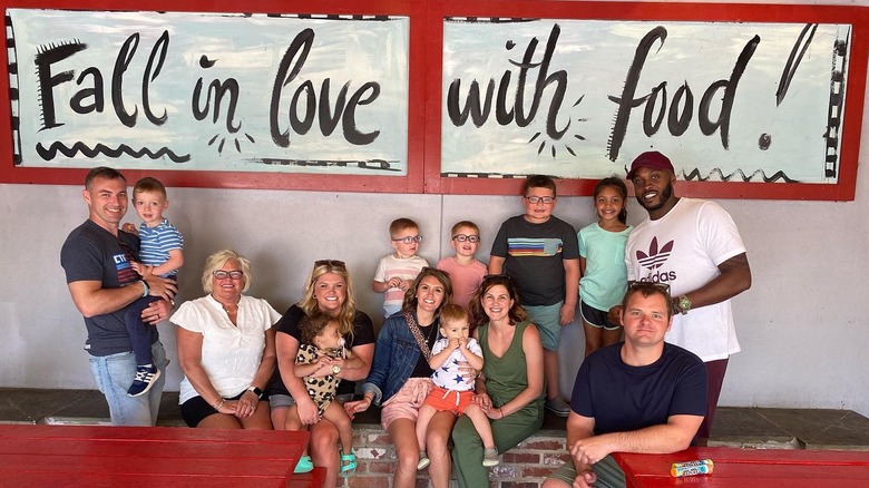 Little Matt's sign with smiling people
