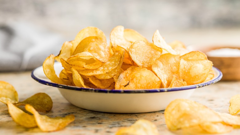 crispy potato chips in bowl