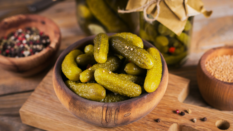 cornichons in a wooden bowl