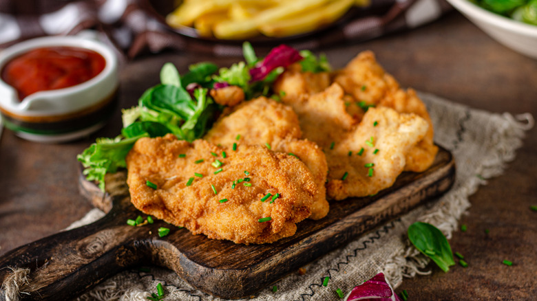 chicken schnitzel on board