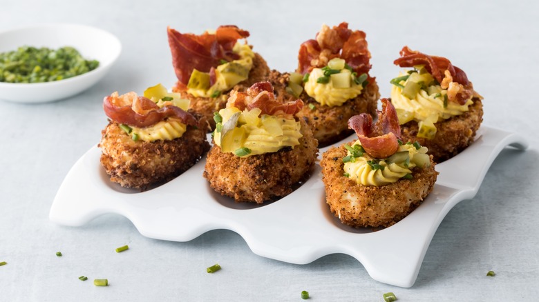 Fried deviled eggs with prosciutto