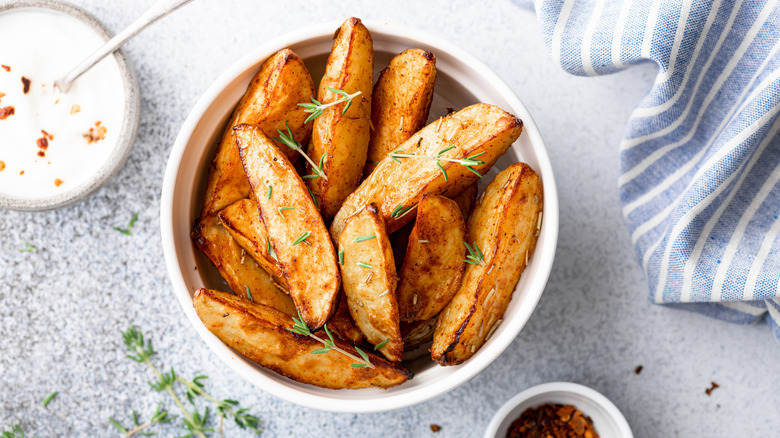 seasoned potato wedges  in a bowl