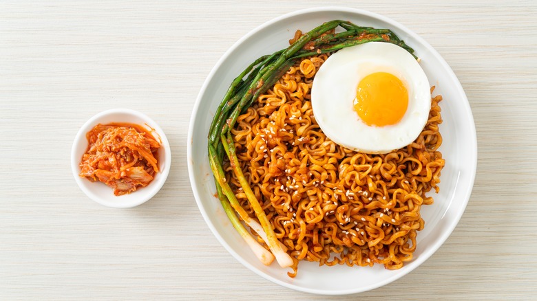 noodles and egg with asparagus