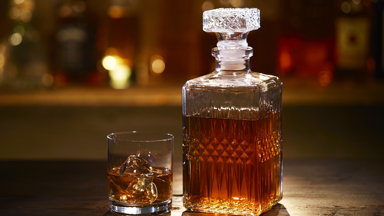 Decanter and glass with bourbon