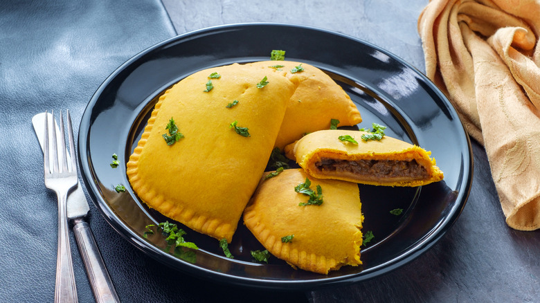 Whole and sliced Jamaican beef patties