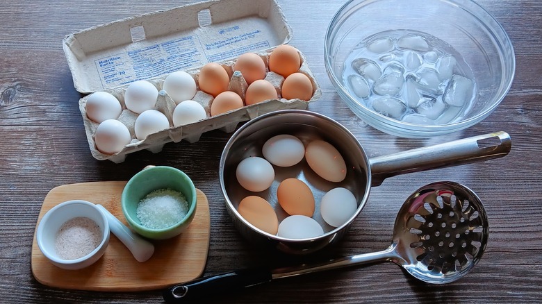 Eggs in carton and pot