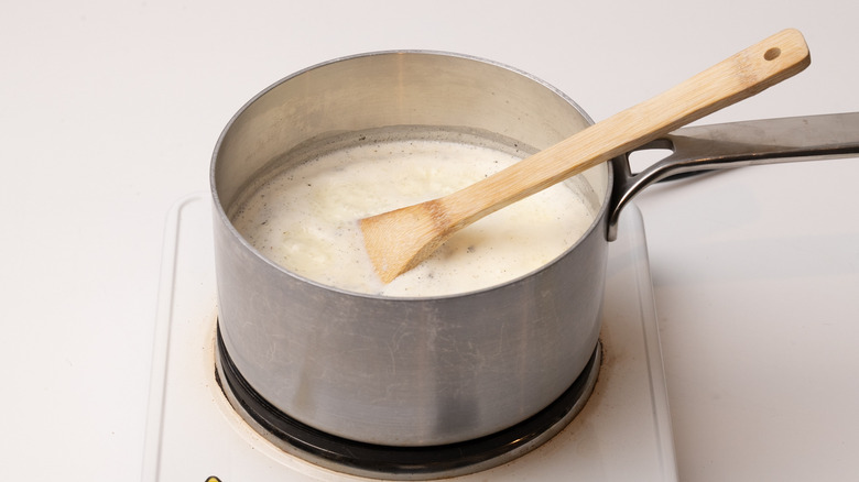 rice pudding simmering in saucepan