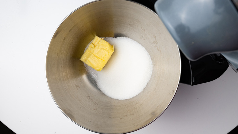 butter and sugar in a mixing bowl 