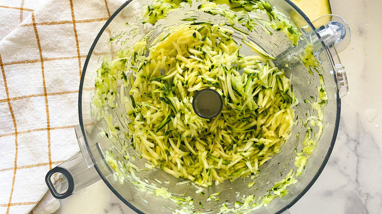 Shredded zucchini in food processor